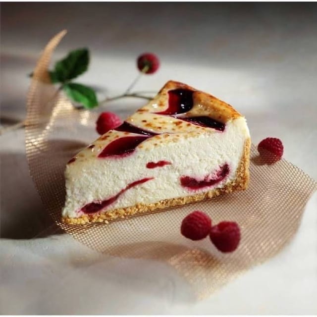 White Chocolate Raspberry Cheesecake.